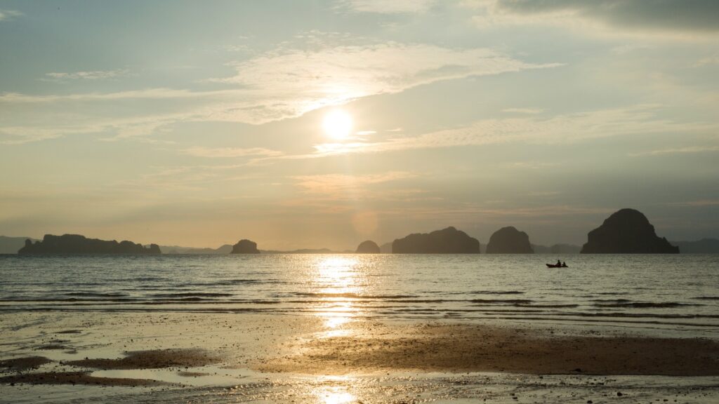 Golden sunrays illuminate TubKaek Beach, Krabi , Thailand